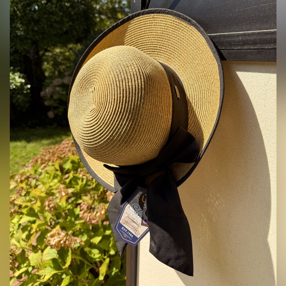 Elegant Straw Hat with Black Ribbon